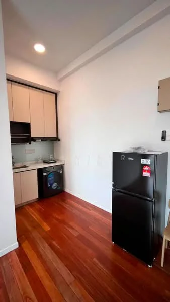 Kitchen features: light wood cabinetry, black countertop, stainless-steel sink, built-in oven, microwave, fridge, washing machine, wooden flooring, recessed downlights; style: modern.