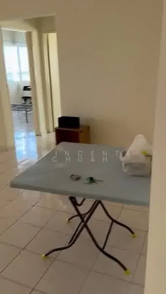 Room features: white painted walls, tile flooring, large windows, folding table, plastic bag, keys on table, wooden cabinet, chairs visible in background.