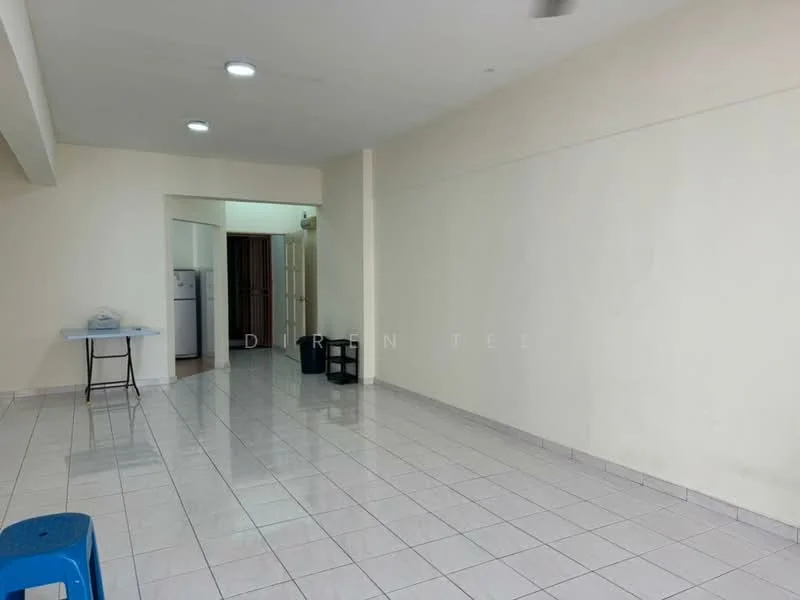 Room features: white painted walls, glossy white tile flooring, recessed downlights, open layout, no visible furniture, large empty space, doorway leading to another room, kitchen area visible in the background; style: minimalist.