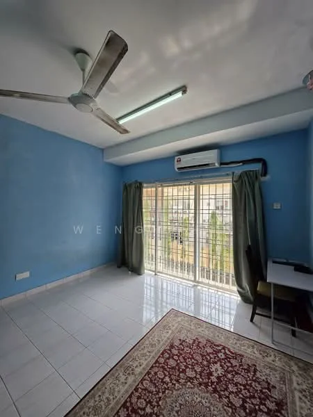 Room features: blue painted walls, white tiled flooring, 5-blade ceiling fan, wall-mounted split AC, floor-to-ceiling sliding glass door, curtains, study desk, area rug with floral pattern; style: modern; view: garden.