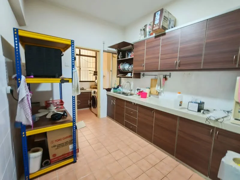 Kitchen features: brown wooden cabinetry, light-colored countertop, single-bowl stainless-steel sink, chrome pull-down faucet, built-in oven, freestanding range oven, ceramic tile flooring, wall-mounted shelves, open shelving unit, dish rack, various kitchen utensils, stacked dishes, refrigerator visible in adjacent room; style: modern.