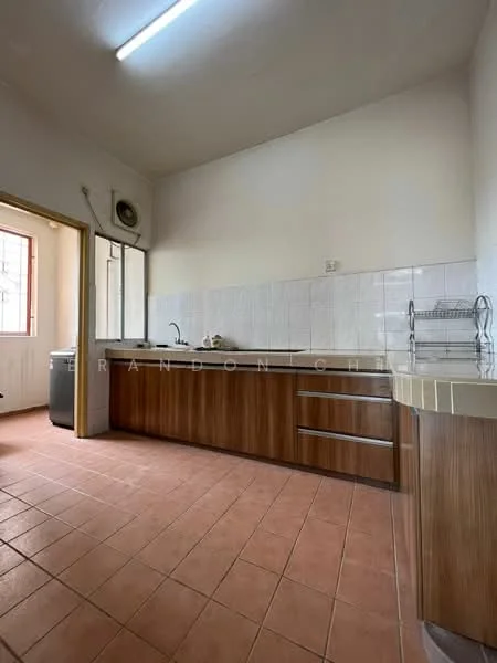 Kitchen features: brown wooden cabinetry, white tiled backsplash, single-bowl stainless-steel sink, chrome pull-down faucet, countertop with integrated sink, washing machine, tile flooring in terracotta color, window with natural light, exhaust fan, recessed ceiling light.