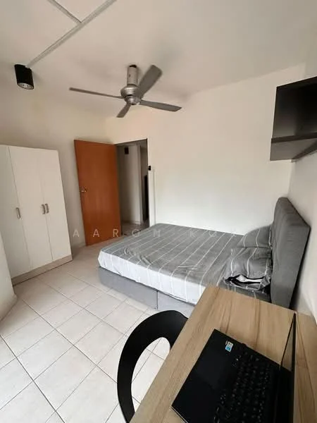 Bedroom features: queen-size bed, upholstered headboard, wall-mounted TV, study desk, black chair, white wardrobe with sliding doors, ceiling fan, tiled flooring, light-colored walls, window with no visible treatment; style: modern.