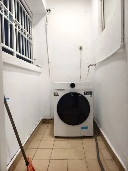 Laundry features: white walls, tile flooring, front-load washing machine, window with security bars, plumbing connections visible, cleaning broom, power outlet, drainage pipe.