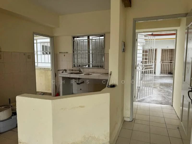Kitchen features: white painted walls, tile flooring, single-bowl sink, wall-mounted cabinets, countertop, window with metal grille, open layout, doorway leading to another room. Room features: tile flooring, doorway leading outside, metal grille door.