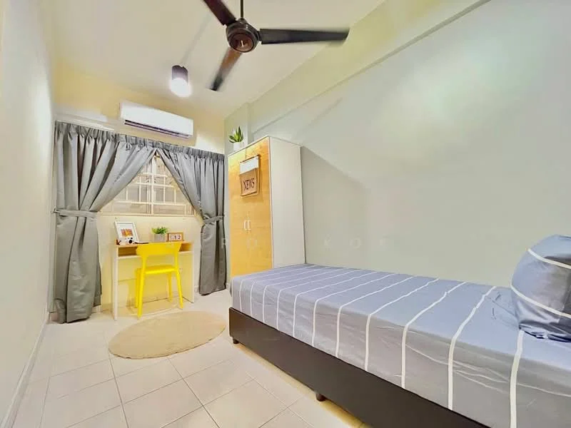 Bedroom features: single bed with grey bedding, white walls, ceiling fan, window with sheer curtains, study desk with yellow chair, built-in wardrobe with wooden door, round area rug, tile flooring, decorative wall art, air conditioning unit; style: modern.