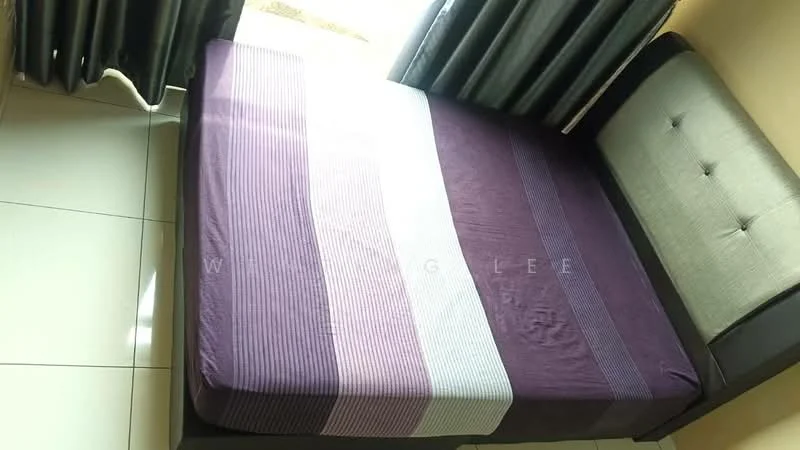 Room features: purple striped bedspread, grey upholstered headboard, single bed, white tiled flooring, black curtains, natural light from window; style: modern.
