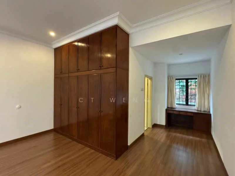 Room features: wooden flooring, white painted walls, crown moulding, built-in wooden wardrobe with multiple doors, window with curtains, desk area with natural light, recessed lighting, neutral color scheme; style: modern.