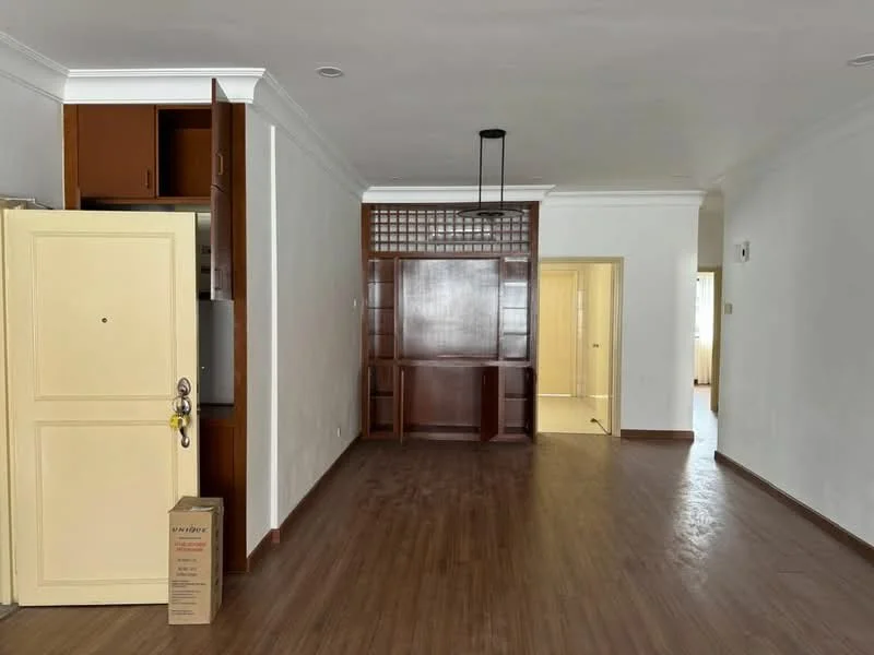 Living features: white painted walls, laminate flooring, ceiling with recessed lighting, built-in wooden shelving unit, doorway leading to another room, yellow cabinet, open layout, natural light from windows; style: modern.