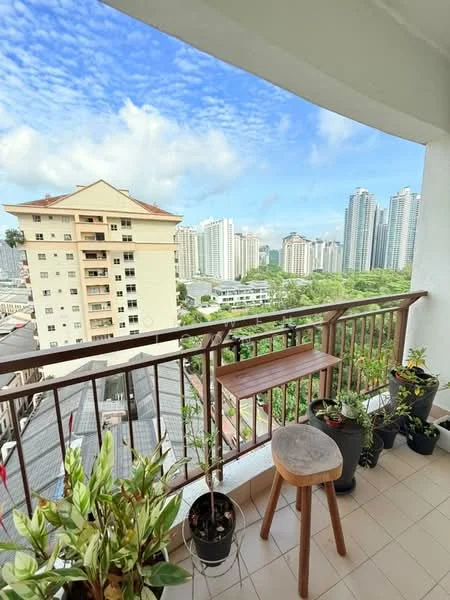Balcony features: wooden railing, tile flooring, small wooden table, stool, potted plants, city skyline view; style: modern; view: city.