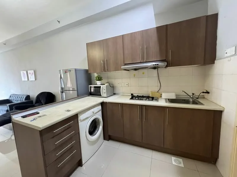 Kitchen features: brown wooden cabinetry, white countertop, stainless-steel sink, chrome pull-down faucet, 4-burner gas hob, built-in oven, microwave, stainless-steel fridge, front-load washing machine, tile flooring, white tiled backsplash, wall-mounted range hood; style: modern.
