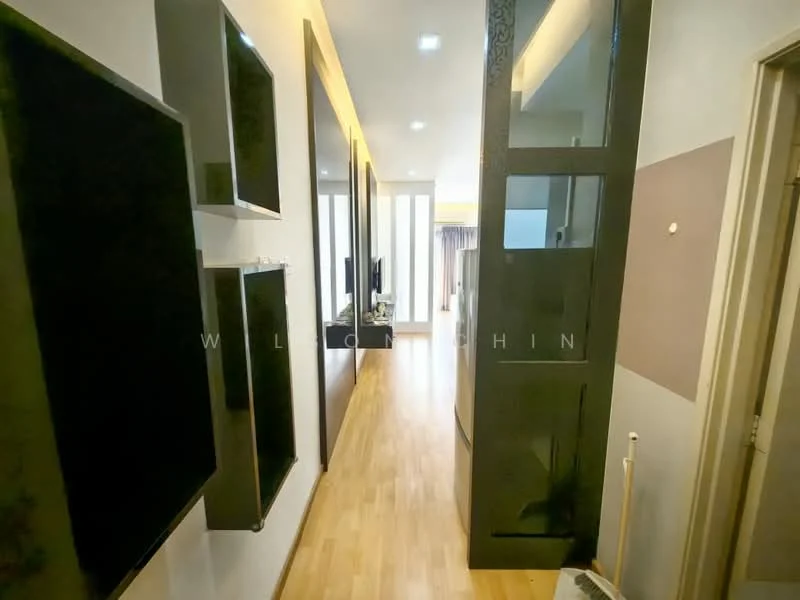 Room features: wooden flooring, white painted walls, black accent wall, built-in wall shelves, recessed ceiling lights, TV console, doorway leading to another room, neutral color scheme; style: modern.