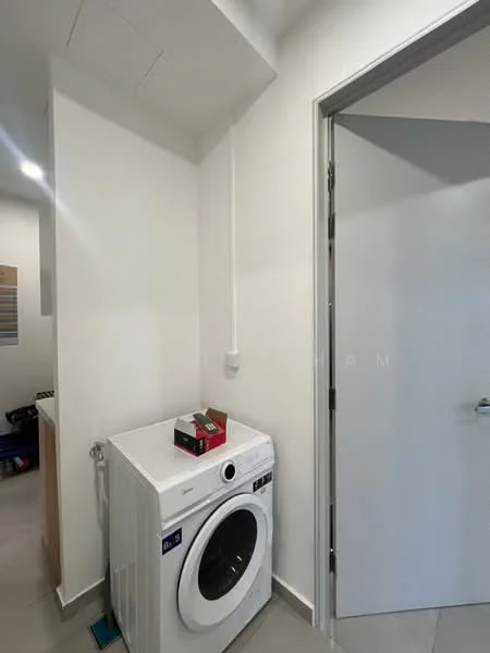 Laundry features: white front-load washing machine, grey tiled flooring, white painted walls, door leading to another room, wall-mounted electrical outlet, small shelf or countertop, light fixture on ceiling; style: modern.