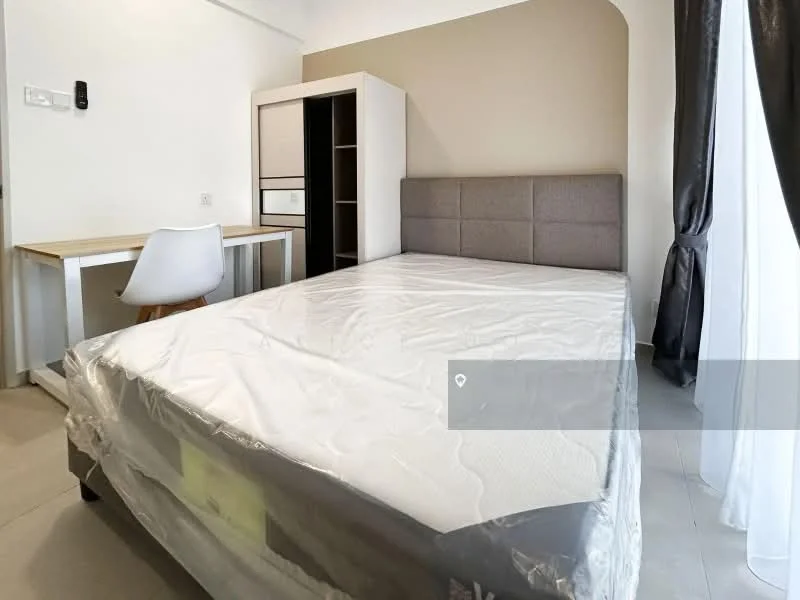 Bedroom features: queen-size bed with mattress protector, grey upholstered headboard, white bedside table, white desk with wooden legs, white chair, built-in wardrobe with shelves, light grey walls, large window with sheer curtains, tile flooring; style: modern.
