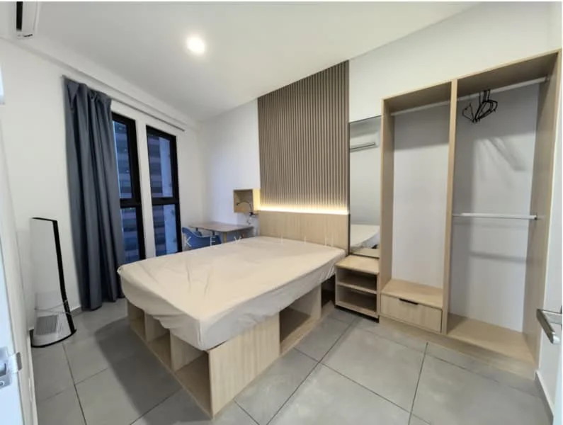 Bedroom features: queen-size bed with beige bedding, wooden bed frame, built-in wardrobe with sliding doors, study desk with chair, table lamp, grey curtains, light grey tiled flooring, wood panel accent wall, wall-mounted light fixture, floor-to-ceiling windows; style: modern; view: city.