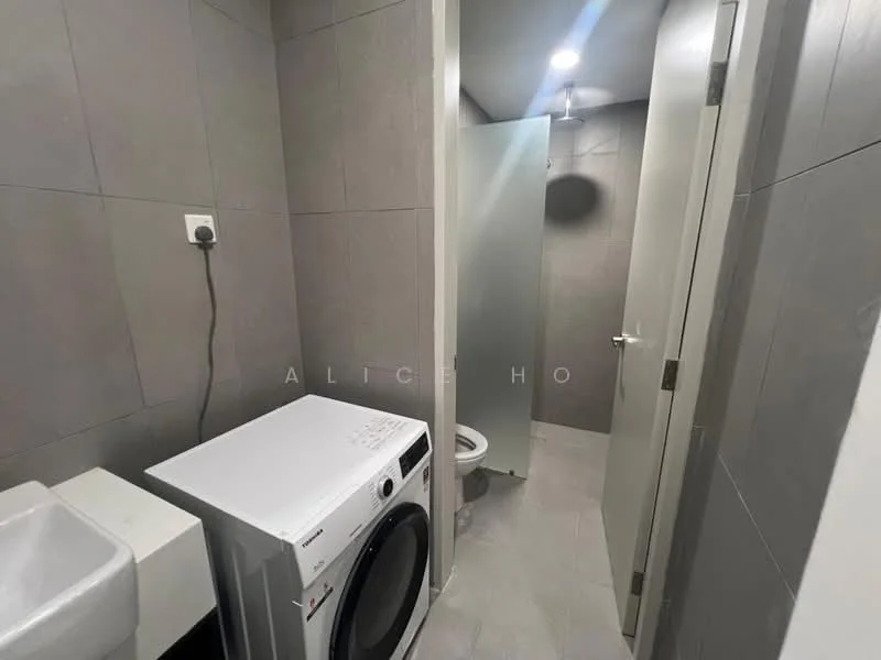 Laundry features: front-load washing machine, single-bowl sink, grey tiled walls, light grey floor tiles, glass shower enclosure, toilet, recessed downlights, white door, white cabinetry; style: modern.