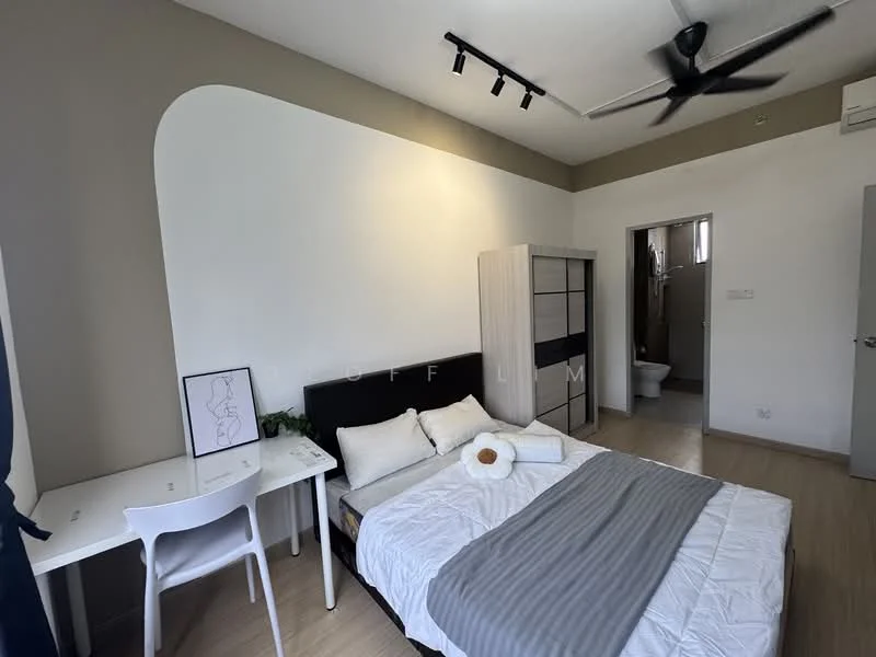 Bedroom features: queen-size bed, upholstered headboard, grey bedspread, white walls with accent wall, wooden flooring, ceiling fan, desk with chair, built-in wardrobe, window with natural light, decorative plant; style: modern. Bathroom features: toilet, sink, mirror.