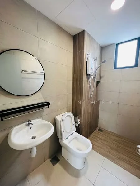Bathroom features: white ceramic toilet, single-sink vanity with circular mirror, chrome basin mixer faucet, shower with wall-mounted shower head, tile flooring, wall-mounted shower control, wood accent wall, grey tiled walls, window for natural light, black shelf above sink; style: modern.