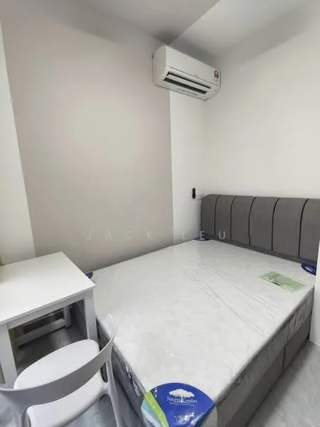 Bedroom features: queen-size bed with grey upholstered headboard, white walls, grey accent wall, air conditioning unit, white study desk, white chair, laminate flooring, bed with mattress, light fixture on ceiling; style: modern.