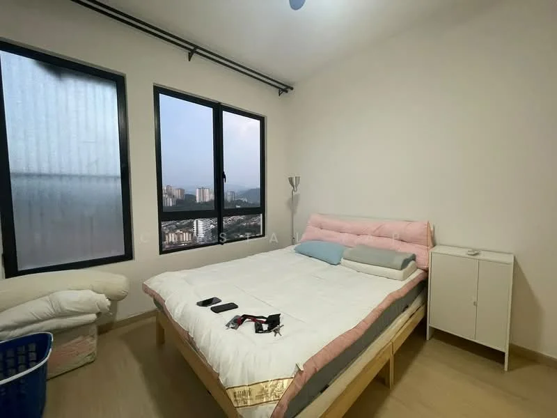 Bedroom features: queen-size bed with pink upholstered headboard, white bedding, two pillows, bedside table, floor-to-ceiling windows, curtains, light fixture on wall, wooden flooring, laundry basket, mobile phone on bed, small cushion on bed; style: modern; view: city.