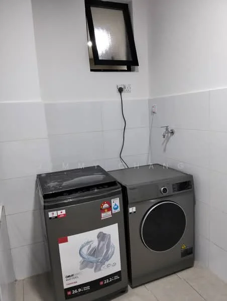 Laundry features: front-load washing machine in grey, tumble dryer in grey, white tiled walls, light grey tiled flooring, window with black frame, wall-mounted faucet, electrical outlet, circuit breaker, shelf above machines; style: modern.