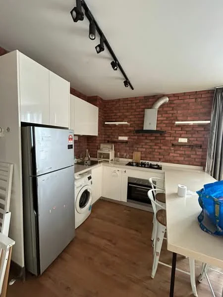 Kitchen features: white cabinetry, stainless-steel fridge, built-in oven, 4-burner gas hob, exposed brick wall, white countertop, white washing machine, track lighting, single-bowl stainless-steel sink, chrome pull-down faucet, open shelving, bar stools, wood laminate flooring; style: modern.