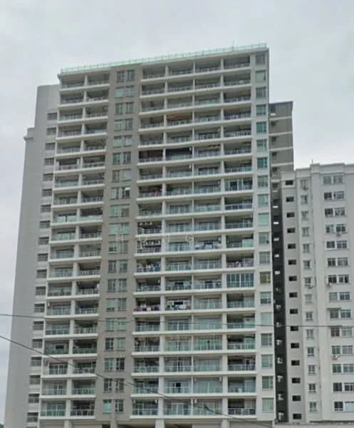 Exterior type: high-rise condominium; features: glass curtain wall, balconies with glass railings, white painted facade, grey accent panels, approximately 15-storey high-rise, multiple windows on each floor, visible outdoor air conditioning units, urban setting with surrounding buildings; style: modern.