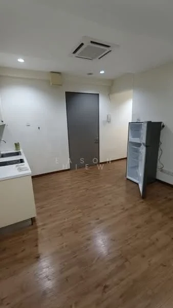 Kitchen features: laminate flooring, white cabinetry, single-bowl stainless-steel sink, chrome pull-down faucet, built-in fridge, wall-mounted split AC, light fixtures, plain painted walls, door leading to another room; style: modern.