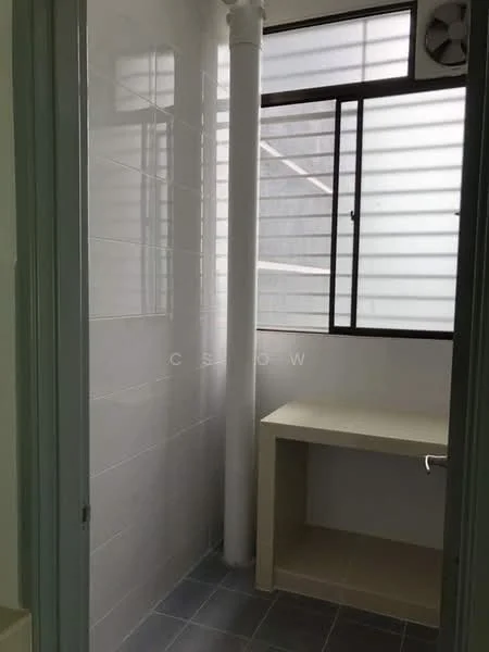 Room features: white tiled walls, grey floor tiles, large window, built-in countertop, exposed pipe, wall-mounted air conditioning unit.