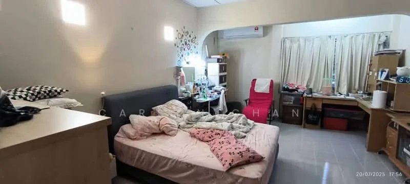 Bedroom features: queen-size bed with pink bedding, upholstered headboard, wooden bedside table, wall-mounted mirror, desk with chair, red armchair, built-in wardrobe, curtains, decorative wall stickers, air conditioning unit, grey tiled flooring.