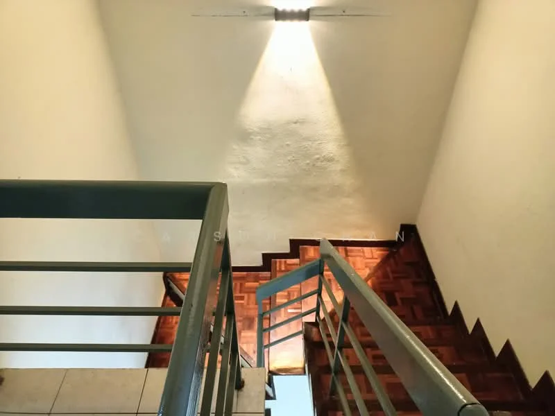 Room features: wooden staircase, metal railing, white painted walls, recessed lighting, parquet wood flooring, tile flooring at base, light fixture on wall.