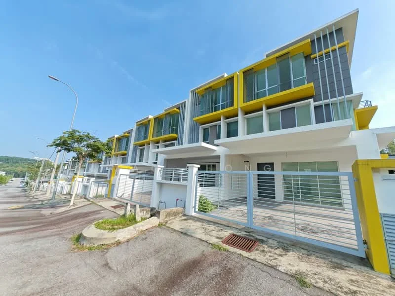 Exterior type: linked terrace house; features: yellow and grey facade, glass windows, balconies with glass railings, two-storey structure, manicured landscaping, paved driveway, gated entrance, modern architectural design; style: modern.