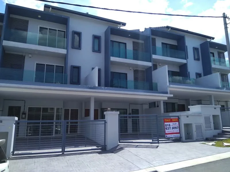 Exterior type: linked terrace house; features: white painted facade, blue accent panels, glass balcony railings, horizontal louvre windows, two-storey structure, manicured front walkway, paved driveway, gated entrance, visible signage for sale; style: modern.