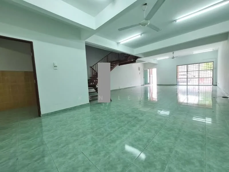 Room features: green ceramic tile flooring, white painted walls, exposed ceiling with fluorescent lights, ceiling fan, large windows providing natural light, staircase leading to upper level, open layout, no visible furniture; style: modern.