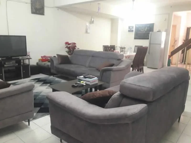Living features: grey fabric sectional sofa, 2-seater grey fabric sofa, coffee table, area rug with geometric pattern, wall-mounted TV, TV console, dining table with chairs, refrigerator, decorative wall art, white painted walls, tile flooring, ceiling light fixture; style: modern.