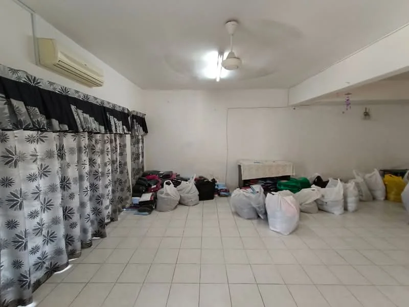 Room features: white painted walls, ceiling fan, tile flooring, curtains with floral pattern, multiple bags on the floor.