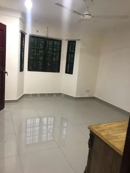 Room features: white painted walls, grey tiled flooring, ceiling fan, multiple windows, wooden door, light fixtures, corner layout, no visible furniture.