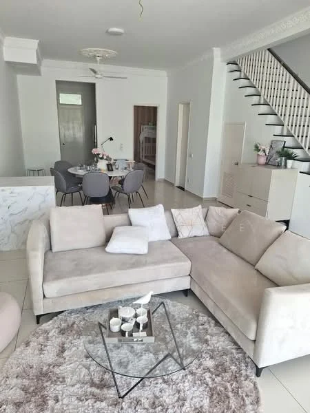 Living features: L-shape sectional sofa in beige, decorative pillows, glass coffee table, area rug with circular pattern, wall-mounted ceiling fan, white painted walls, tile flooring, decorative wall molding, staircase with white balustrade, open layout to dining area; style: modern. Dining features: 6-seater dining table, upholstered dining chairs, decorative centerpiece, white cabinetry, open access to living area; style: modern.