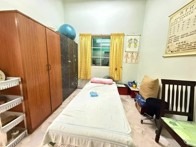 Bedroom features: single bed with white bedding, wooden wardrobe with sliding doors, green curtains, window with view to outside, exercise ball, wooden chair, small side table, decorative wall art, marble flooring, light-colored walls, area rug.