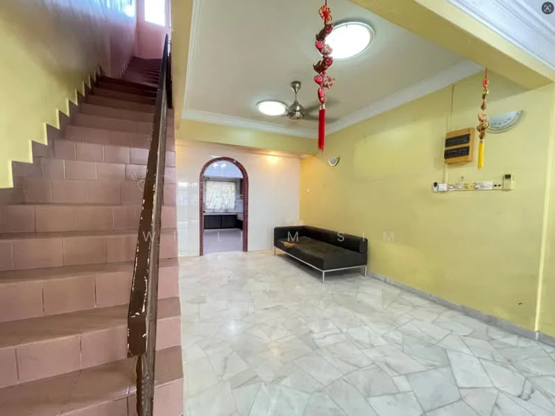 Living features: marble flooring, yellow painted walls, ceiling with recessed lights, 5-blade ceiling fan, sofa in black upholstery, arched doorway, staircase with wooden railing, decorative wall hangings; style: traditional.