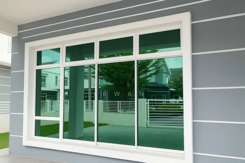 Exterior features: large green-tinted windows, white window frames, grey painted facade, horizontal white stripes on facade, manicured lawn in foreground, visible fence in background; style: modern.