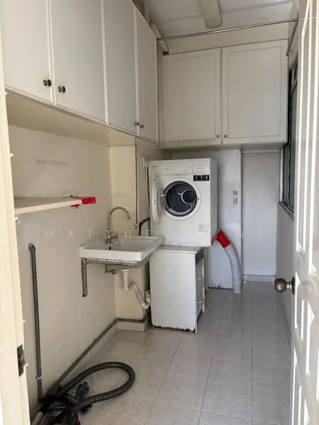 Laundry features: single-bowl stainless-steel sink, front-load washing machine, white cabinetry, white walls, tile flooring, window for natural light, shelving above sink, hose for vacuum cleaner.