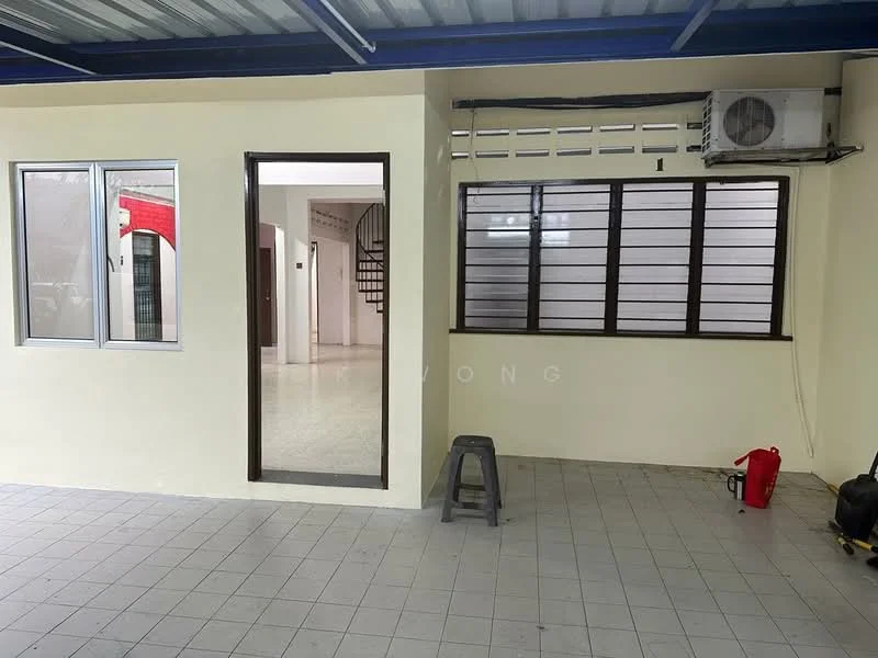 Room features: cream painted walls, grey tiled flooring, sliding windows with horizontal bars, wall-mounted split AC unit, open doorway leading to another room, stool, fire extinguisher, exposed ceiling beams.