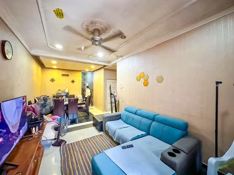 Living features: blue fabric sofa, 3-seater sofa, ceiling fan, wall-mounted TV, wooden TV console, decorative wall clock, striped area rug, light-colored walls, crown moulding, dining area visible in background; style: modern.