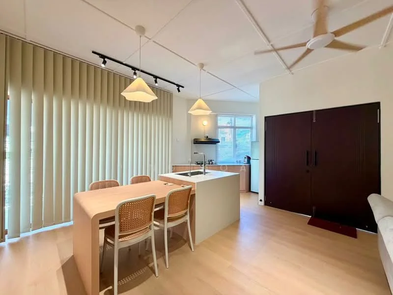 Dining features: wooden dining table, 4 dining chairs with cane backs, pendant lighting above table, vertical blinds on window, light-colored laminate flooring, open kitchen layout, kitchen island with sink, wall-mounted cabinets, countertop with appliances; style: modern.