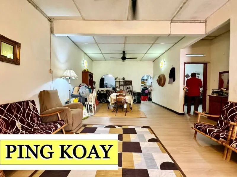 Living features: laminate flooring, white painted walls, ceiling fan, 3-seater fabric sofa in brown, 2-seater fabric sofa with patterned upholstery, area rug with geometric pattern, table lamp, wooden coffee table, decorative wall mirror, wall-mounted shelves, dining area visible in background, open layout; style: traditional.