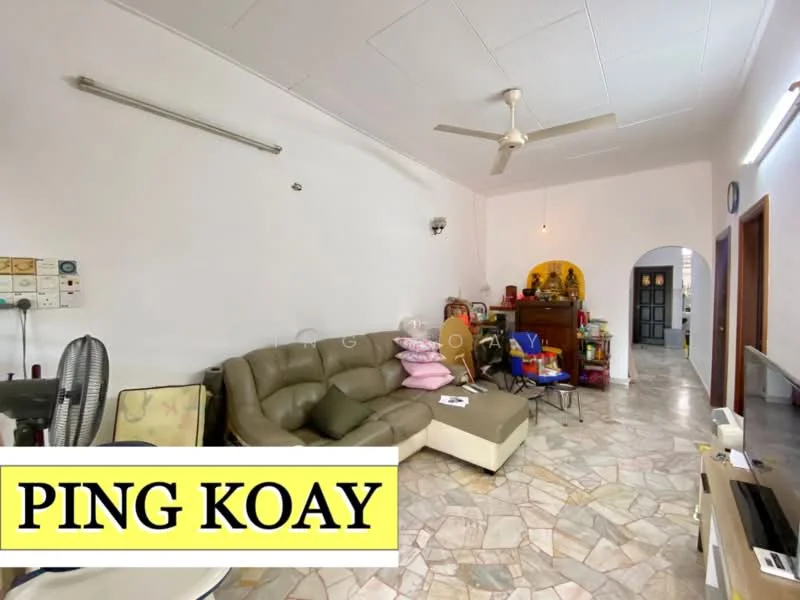 Living features: 3-seater fabric sofa in beige, ceiling fan, marble flooring, wall-mounted light fixture, decorative wall shelf, wooden cabinet, various decorative items, open layout, white painted walls.