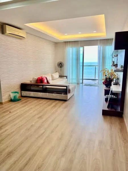 Living features: light wood laminate flooring, white painted walls, tray ceiling with recessed lighting, floor-to-ceiling sliding glass door, sheer curtains, ceiling fan, sofa with decorative cushions, wall-mounted shelf, decorative plants, ocean view; style: modern; view: sea.
