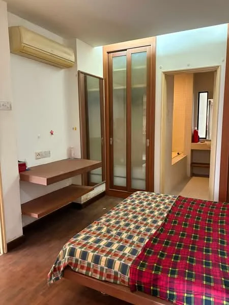 Bedroom features: queen-size bed with plaid bedding, wooden flooring, built-in wardrobe with sliding glass doors, wall-mounted air conditioning unit, wooden shelf unit, neutral painted walls, en-suite bathroom access, natural light from window; style: modern.