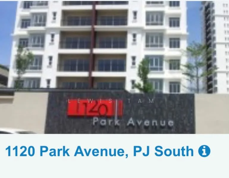 Exterior type: high-rise condominium; features: glass curtain wall, white painted facade, red accent signage, multiple balconies, landscaped entrance, surrounded by greenery; style: modern.